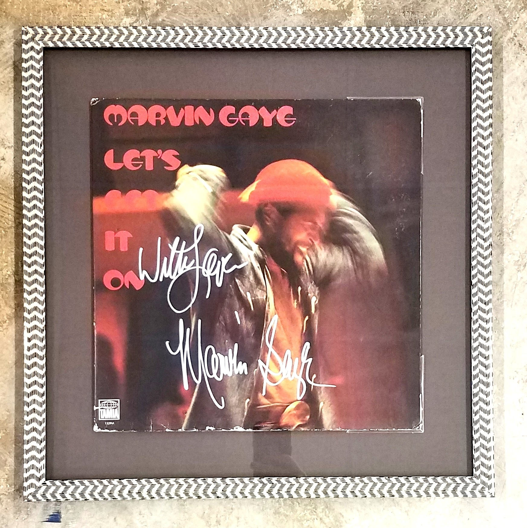 Framed concert poster with UV-protective glazing