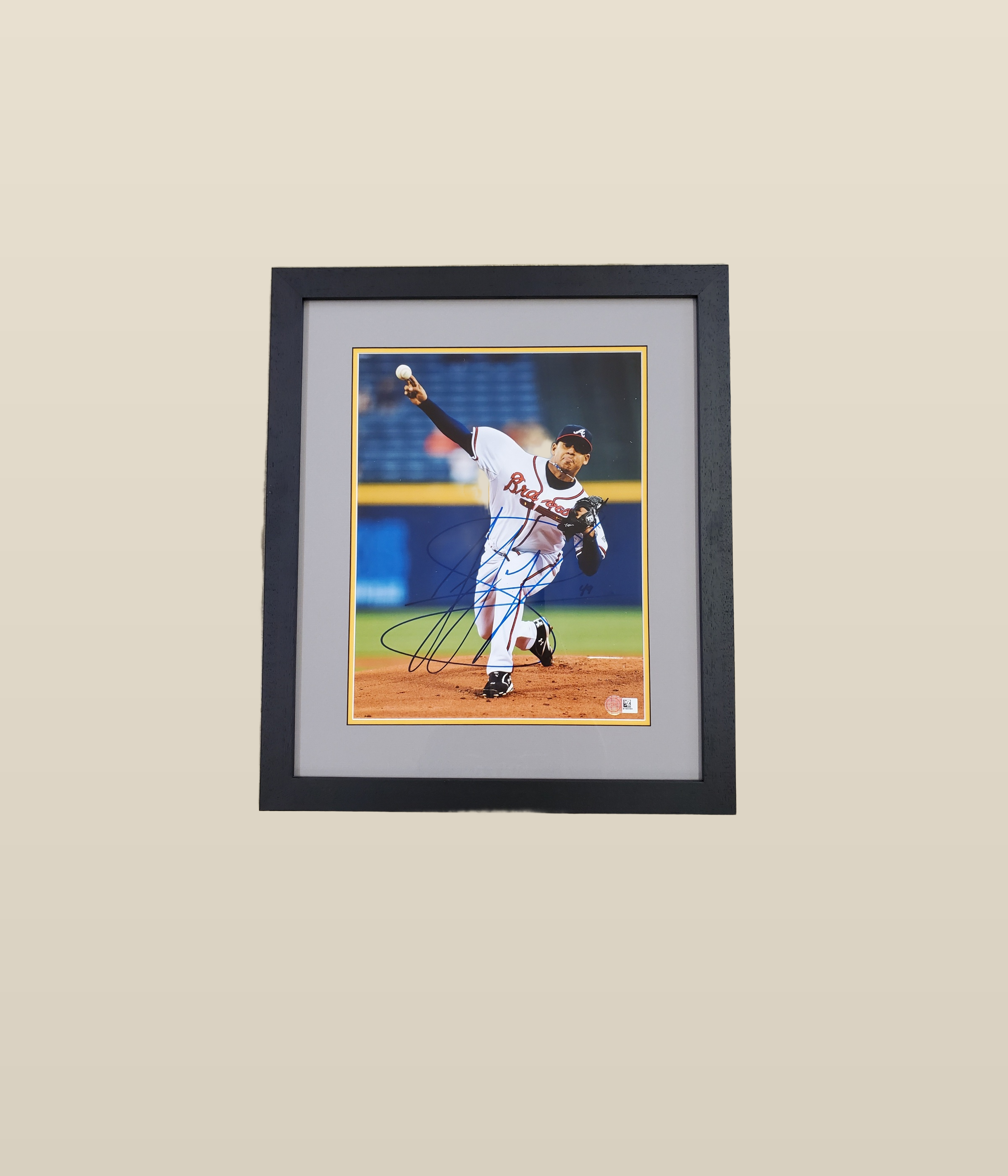 Framed sports memorabilia and jersey shadow box