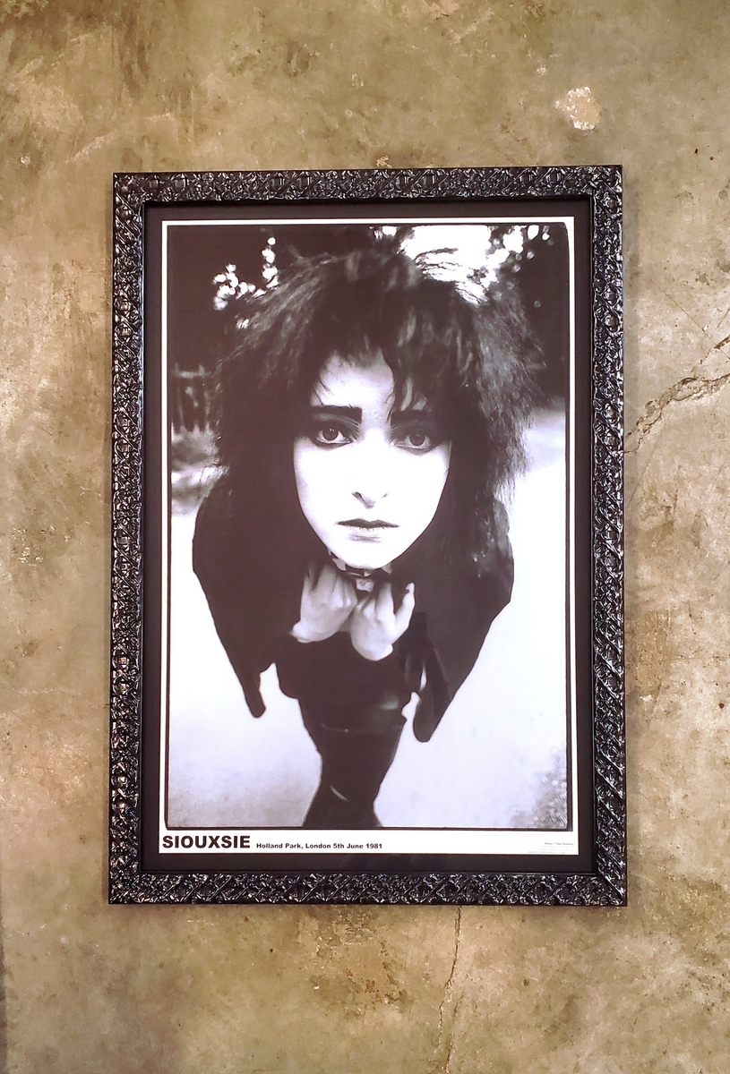 Framed concert poster with UV-protective glazing